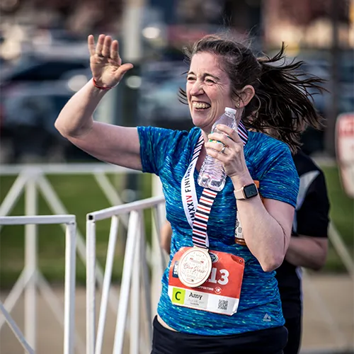 woman post race high five woman post race high five